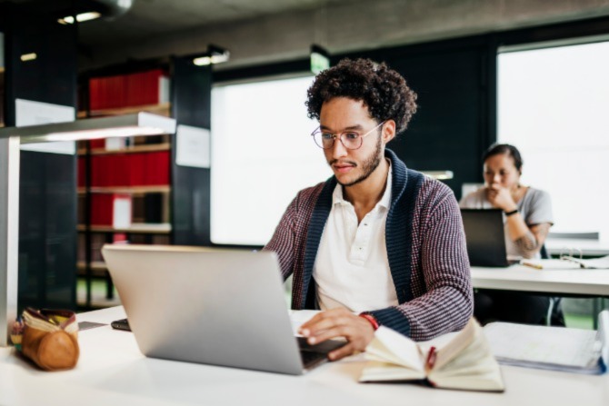 A man studying for cybersecurity training